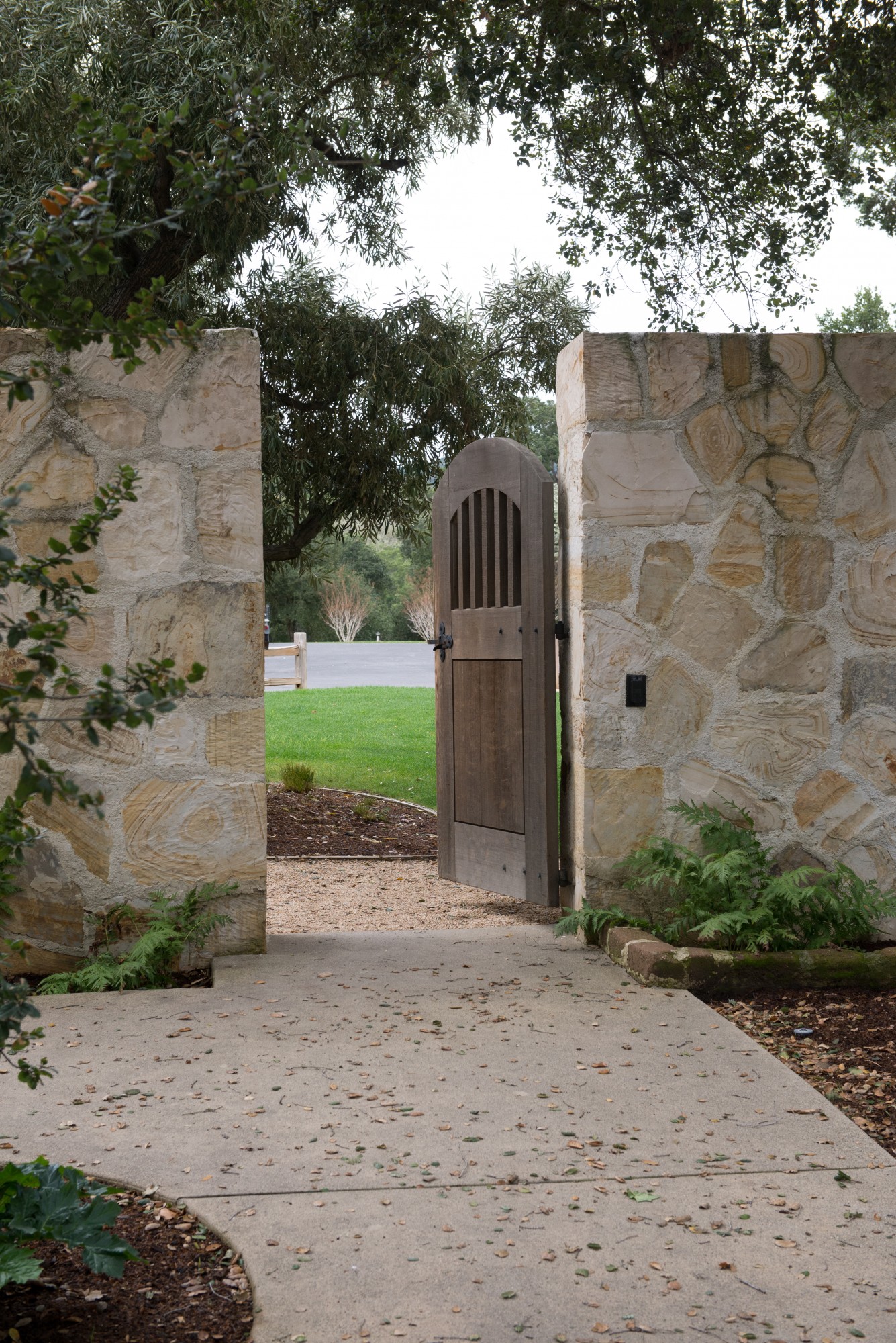Holman Ranch, California winery, California coast wedding venue, arched wood door