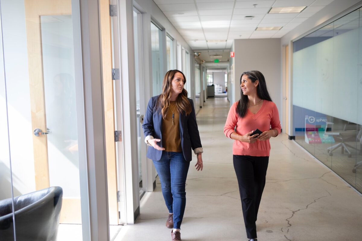 Women walking in an office