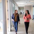 Women walking in an office